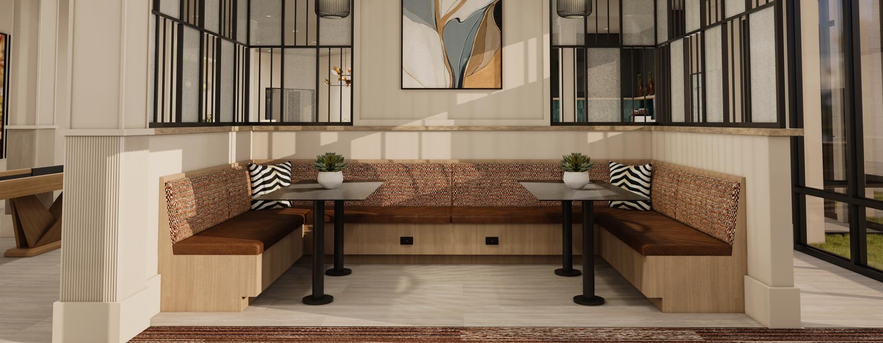 a room with a large table and booth seating